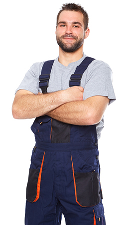 Portrait of smiling worker in blue uniform